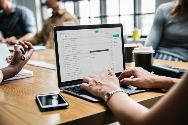 Two colleagues working at a desk